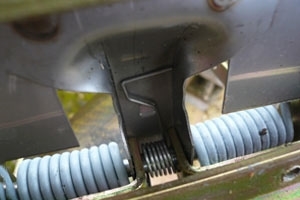 The smaller spring under the treadle of a DOC trap prevents misfires caused by the repeated passage of small rodents